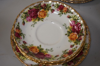 A Royal Albert Old Country Roses part tea set comprising twelve trios, a two tier cake stand, sugar bowl and cream jug. Condition - good